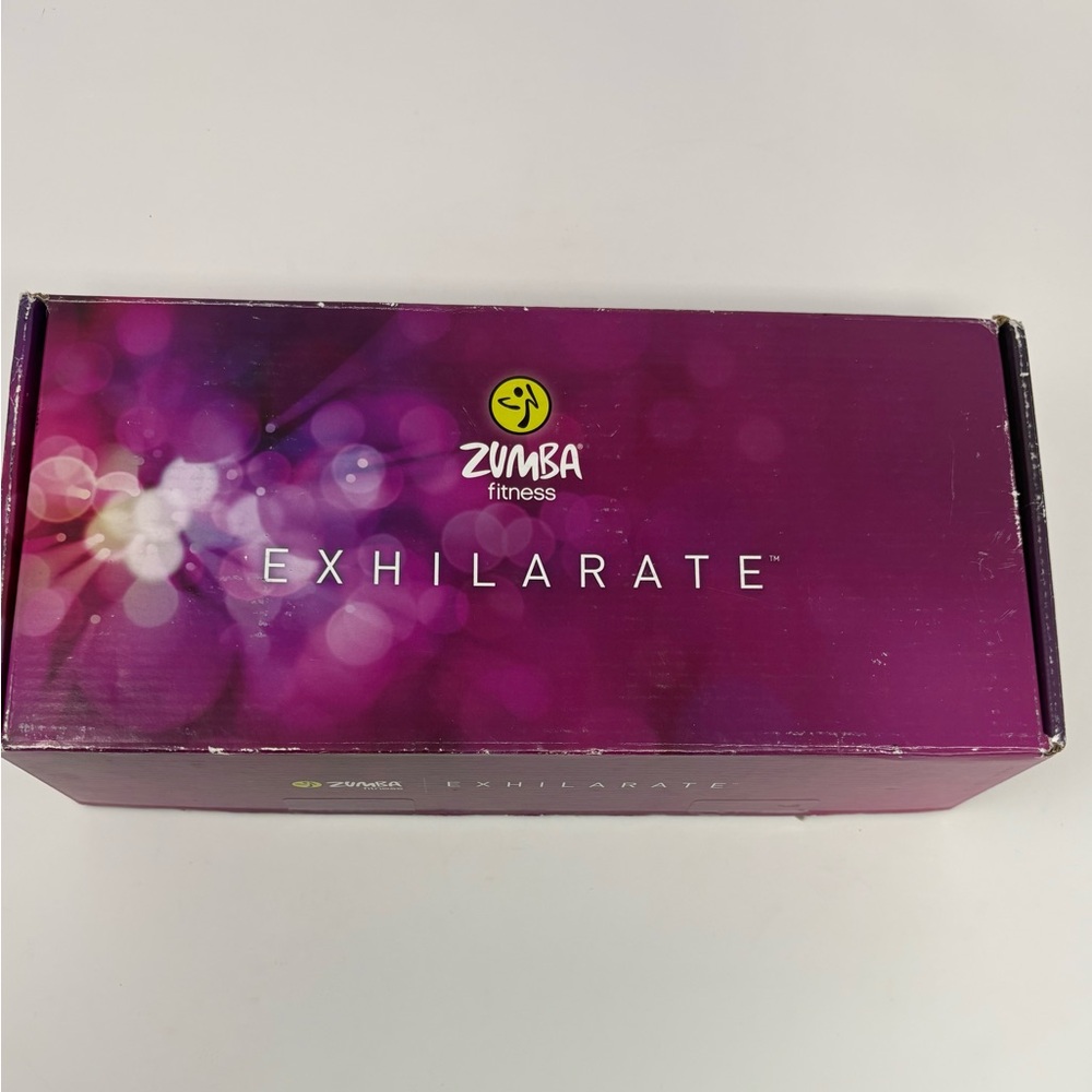 Zumba Fitness Exhilarate Program Guide with Purple Box 4 DVD Set